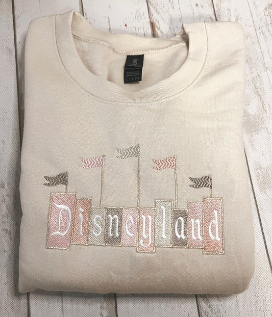 Neutral Disneyland Sign Embroidered Crewneck
